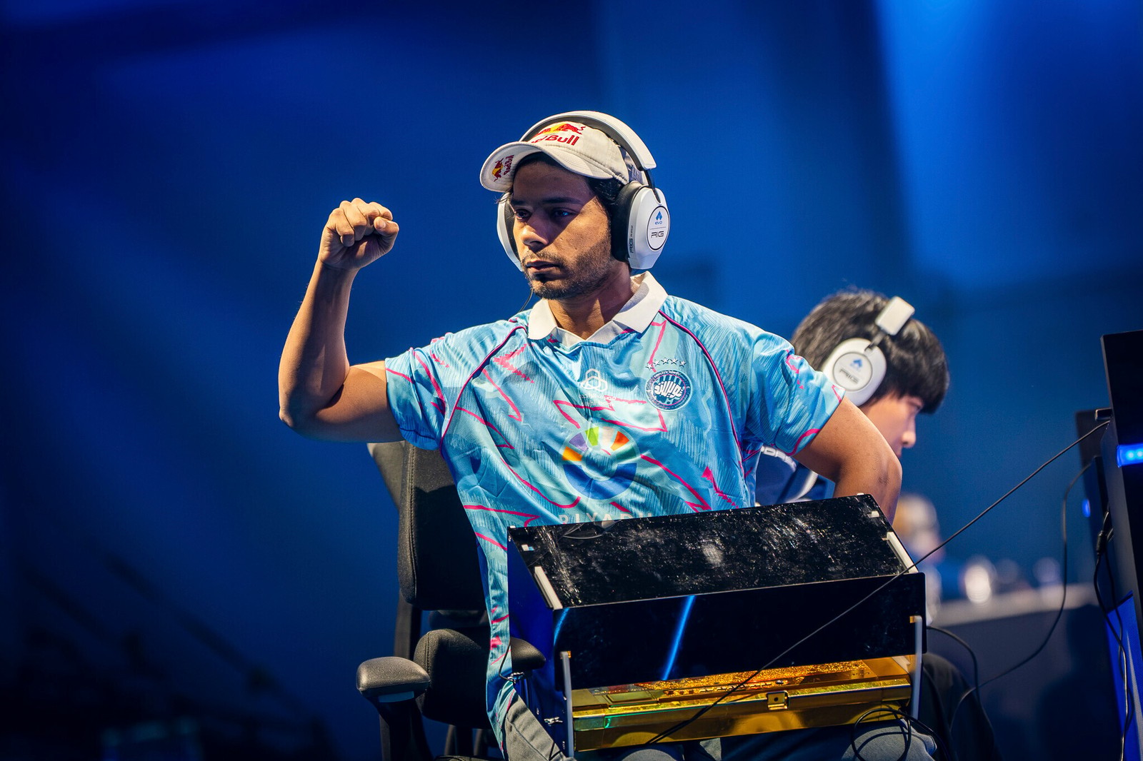 Arslan Ash pumps his fist in the air in a brief celebration of a match win on the main stage of Evo Championship Series in Las Vegas, Nevada, USA on June 29, 2026 // Natalia Martinez / Red Bull Content Pool // SI202606290116 // Usage for editorial use only //